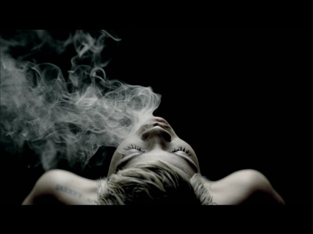 Rihanna blowing smoke